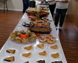 Tables set with food.