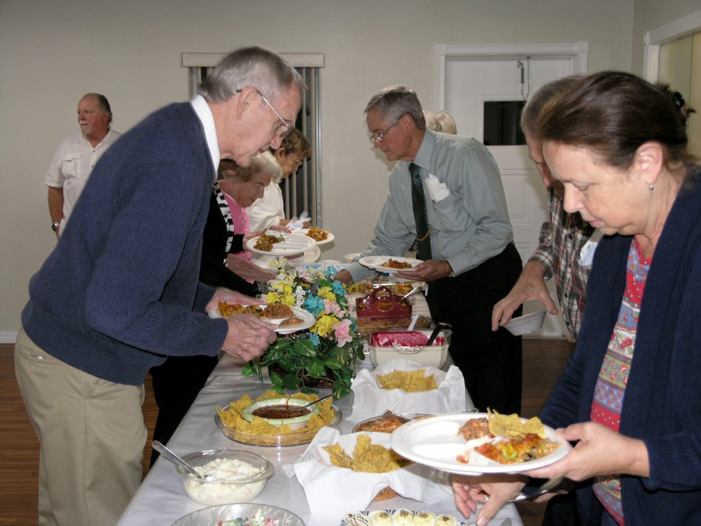 Digging in at the fellowship meal.