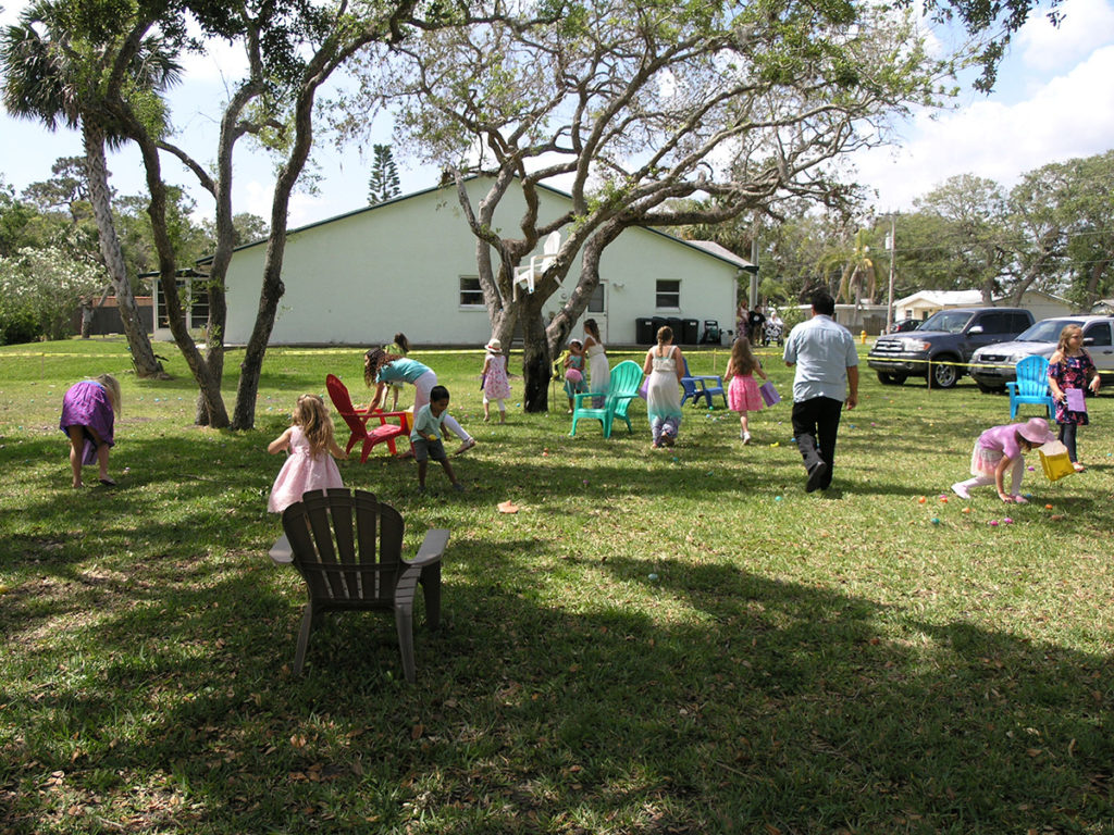 Children hunt for eggs at the church egg hunt