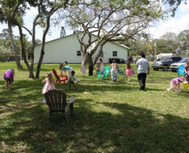 Children hunt for eggs at the church egg hunt